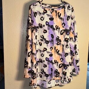 LuLaRoe Nora long-sleeve boat neck top with an animal print size medium excellen